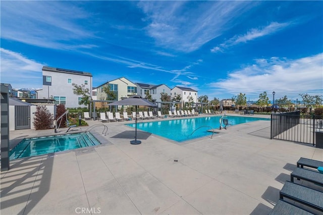 view of swimming pool featuring a patio