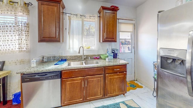 kitchen with sink and stainless steel appliances