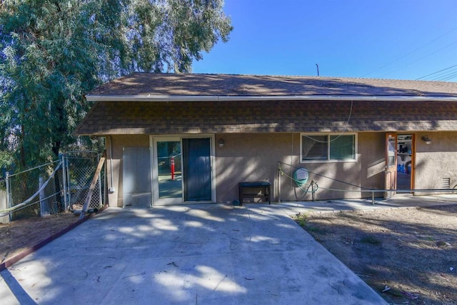 view of front of home with a patio