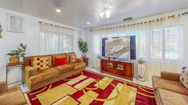 living room with ceiling fan