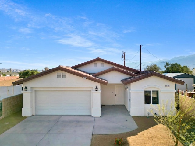 view of front of house with a garage