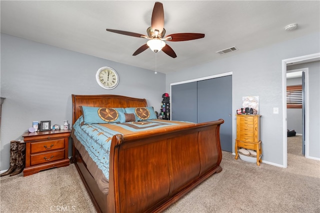 carpeted bedroom featuring ceiling fan