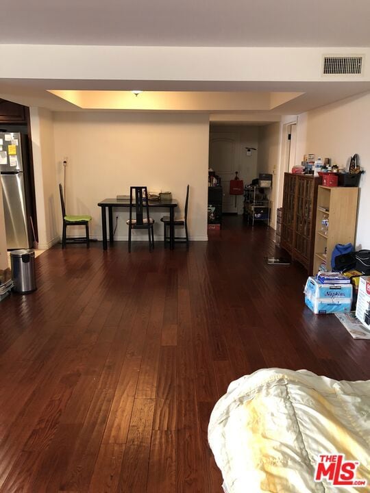 dining room with dark hardwood / wood-style floors