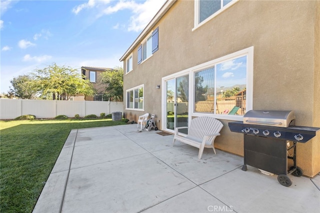 view of patio with a grill and cooling unit