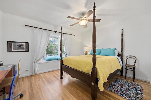 bedroom featuring ceiling fan and light hardwood / wood-style flooring