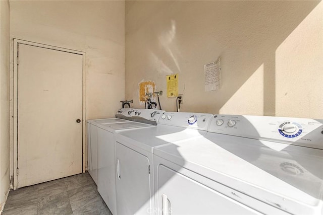 laundry room featuring independent washer and dryer