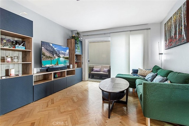 living room with light parquet floors