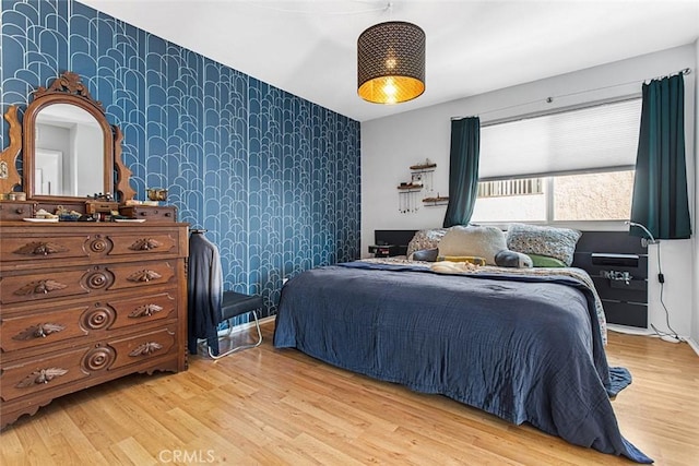 bedroom featuring light hardwood / wood-style floors