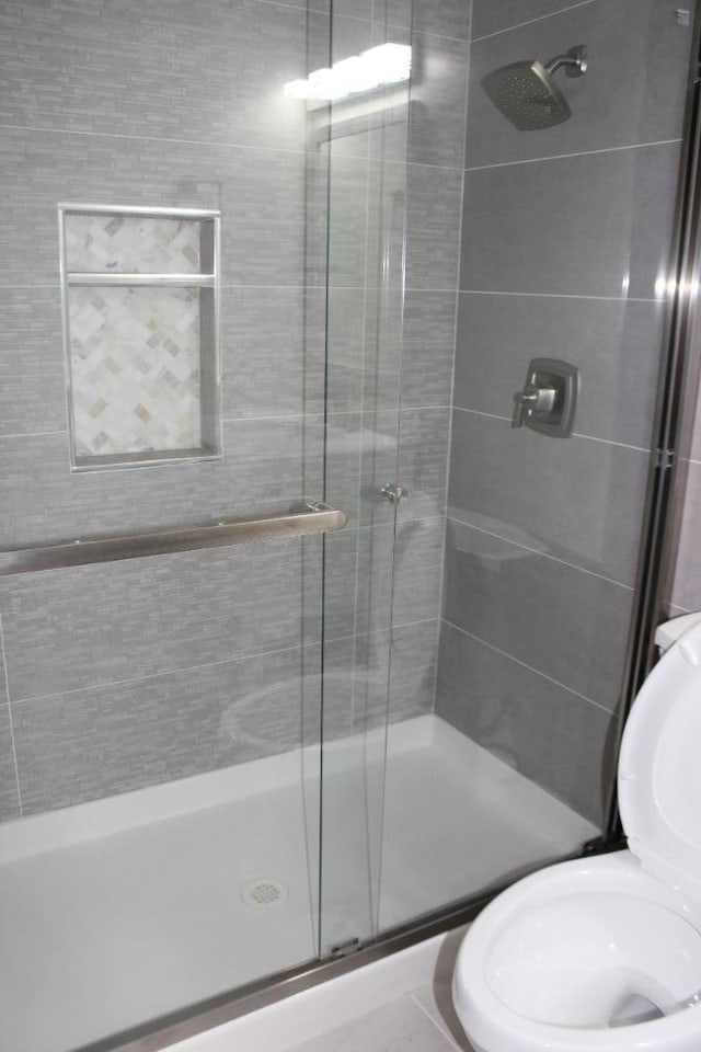 bathroom with an enclosed shower