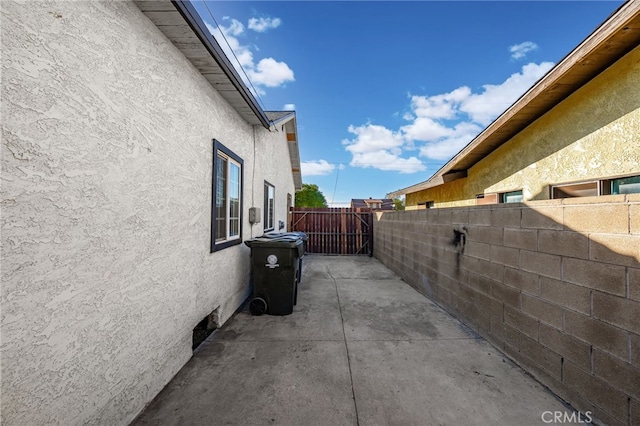 view of property exterior featuring a patio