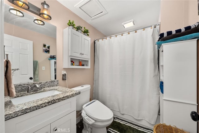 full bathroom featuring vanity, shower / bath combo, and toilet