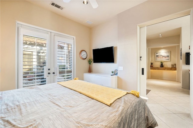 bedroom featuring access to exterior, light tile patterned floors, french doors, and ceiling fan