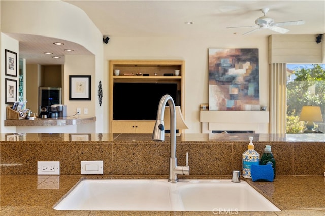 kitchen featuring sink and ceiling fan