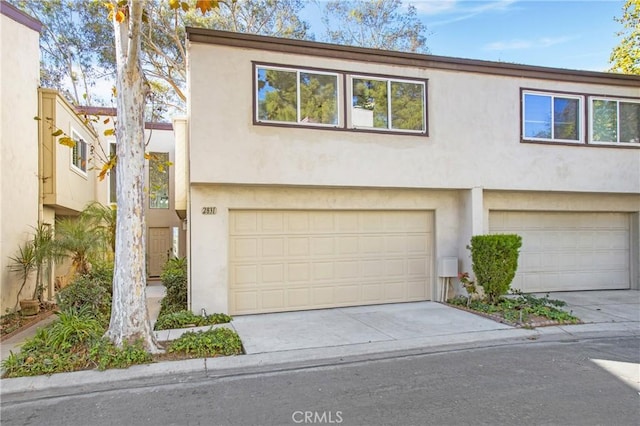 view of property featuring a garage