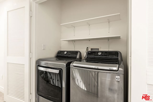 washroom with separate washer and dryer