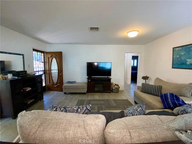 living room with hardwood / wood-style floors