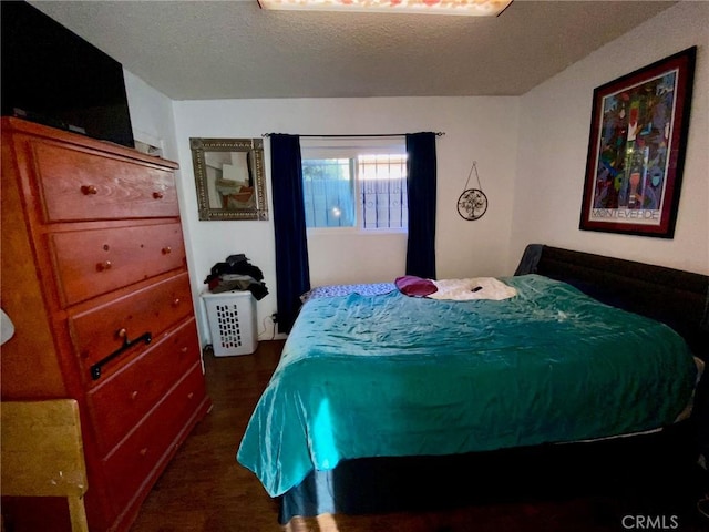 bedroom featuring a textured ceiling