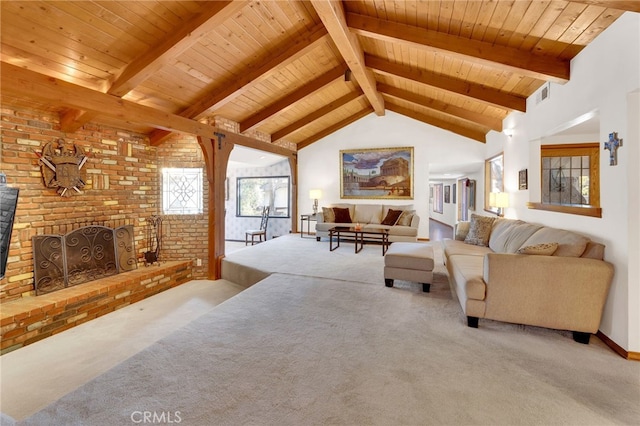 carpeted living room with vaulted ceiling with beams, wood ceiling, and a brick fireplace