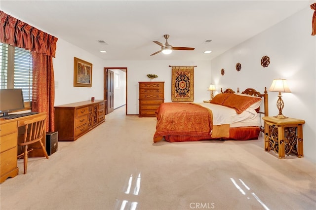 bedroom with visible vents and a ceiling fan