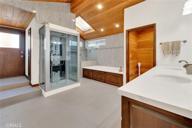 bathroom featuring lofted ceiling with skylight, vanity, wood ceiling, and shower with separate bathtub