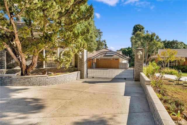 view of front of house featuring a gate and fence