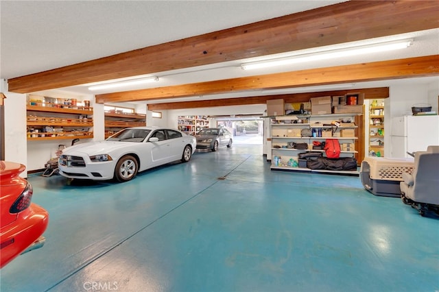 garage featuring freestanding refrigerator