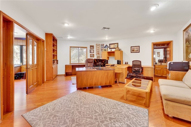 office featuring light hardwood / wood-style floors