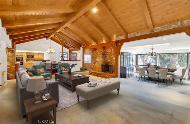 carpeted living room featuring lofted ceiling with beams, a fireplace, wooden ceiling, and an inviting chandelier