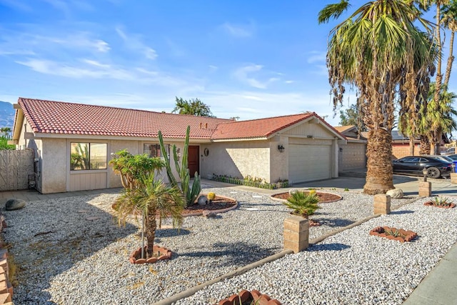 ranch-style home with a garage