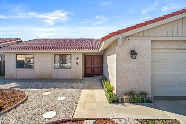 property entrance with a garage