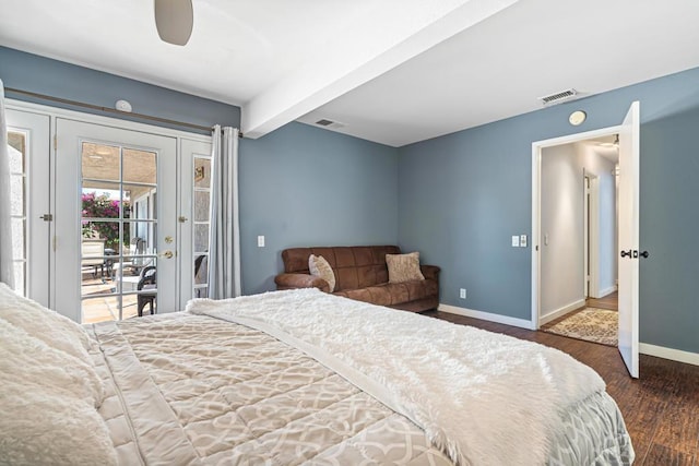 bedroom with access to exterior, dark hardwood / wood-style floors, ceiling fan, and beamed ceiling