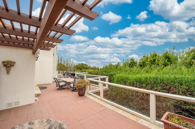 view of patio featuring a pergola