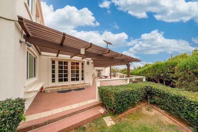 back of house with a pergola