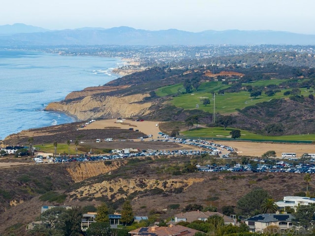 bird's eye view with a water and mountain view