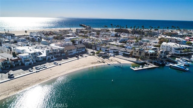 aerial view featuring a water view and a view of the beach