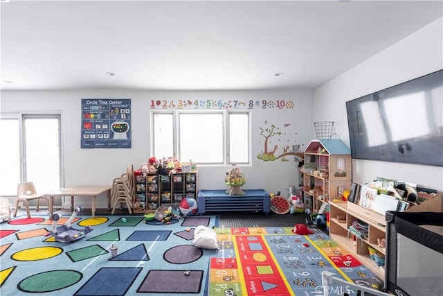 playroom featuring a wealth of natural light