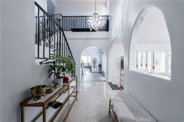 foyer entrance featuring a chandelier