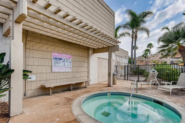 view of swimming pool featuring a pergola, a patio, and a hot tub