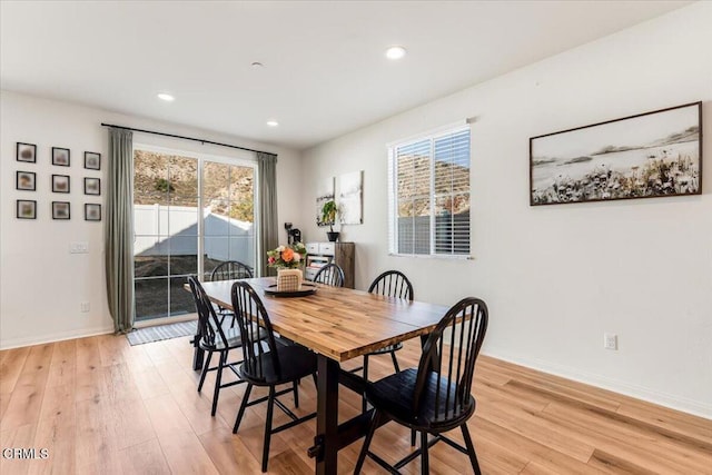 dining area with light wood-type flooring