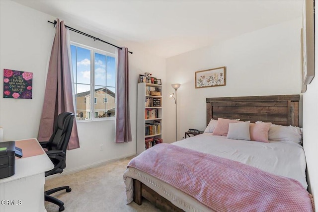 bedroom with light carpet