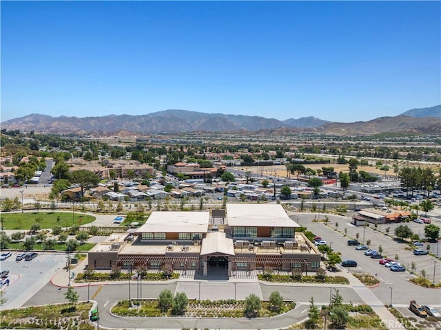 birds eye view of property featuring a mountain view