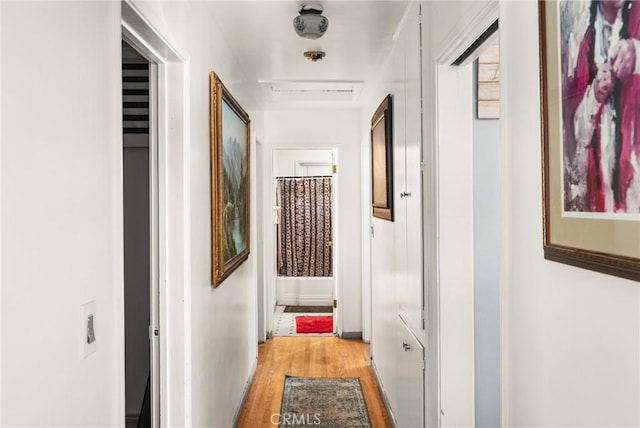 hall featuring light wood-type flooring