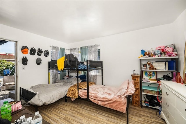 bedroom featuring hardwood / wood-style flooring