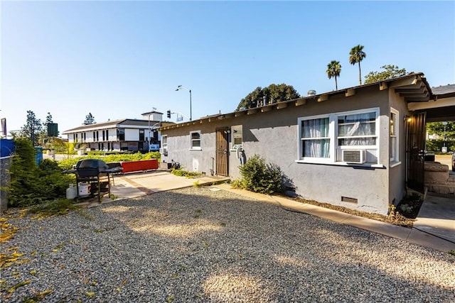 view of front of home with a patio