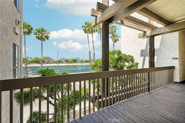 deck featuring a water view