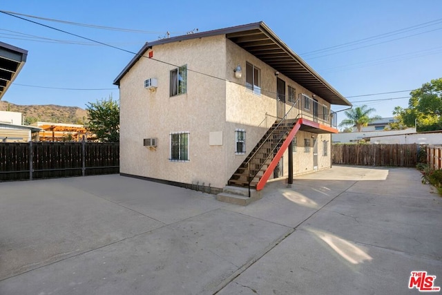 rear view of house with a patio