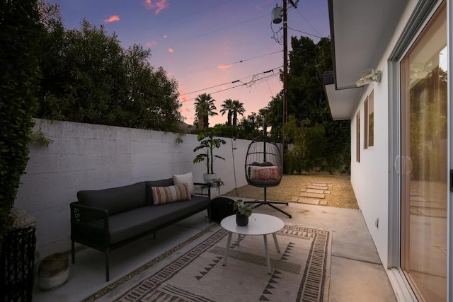 patio terrace at dusk with outdoor lounge area