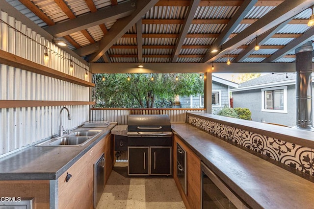 view of patio / terrace featuring wine cooler, a grill, exterior kitchen, and sink