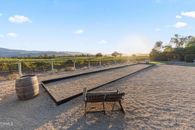 surrounding community with a rural view and a mountain view