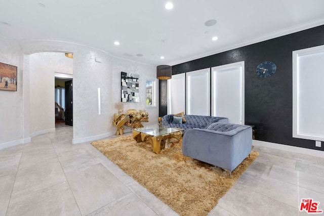 living room with ornamental molding